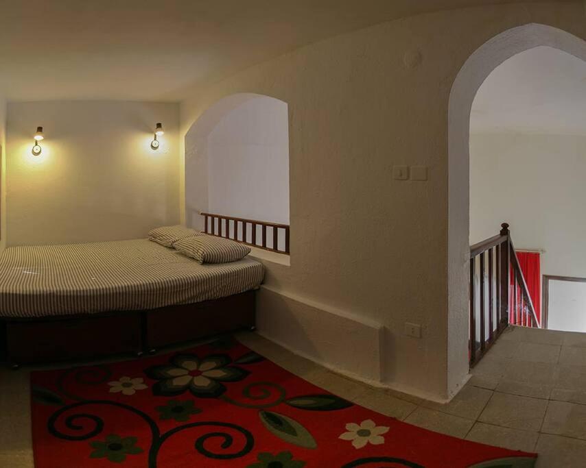 Postel nebo postele na pokoji v ubytování Abouseif Guest House