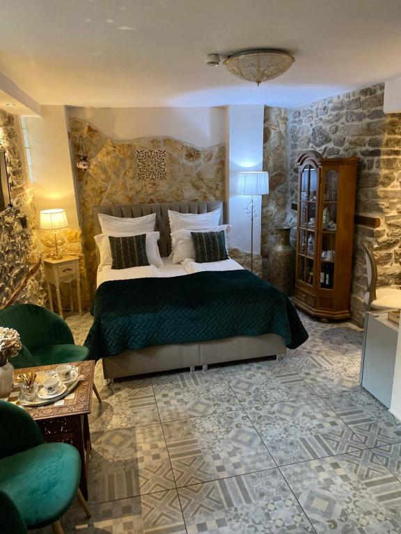 Postel nebo postele na pokoji v ubytování Villa Aurelia Old Town