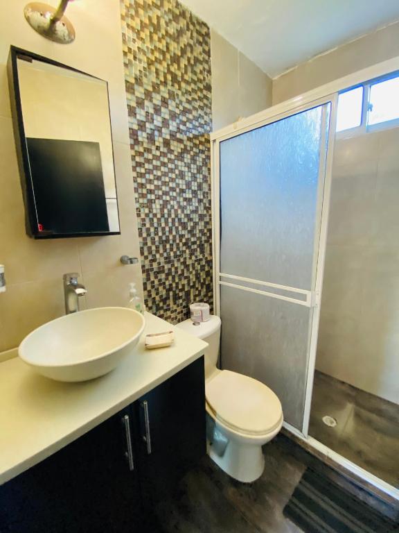 Un baño de Apartamentos Sweet Island