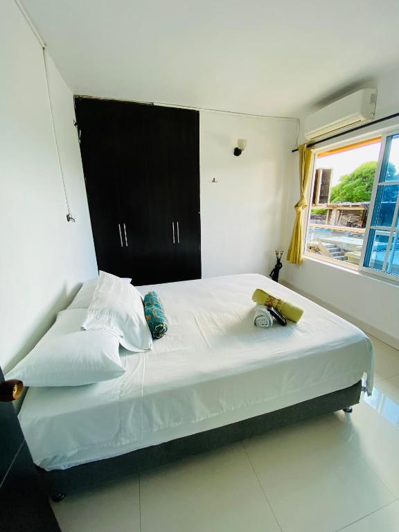 Cama o camas de una habitación en Apartamentos Sweet Island
