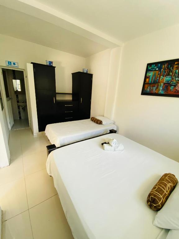 Cama o camas de una habitación en Apartamentos Sweet Island