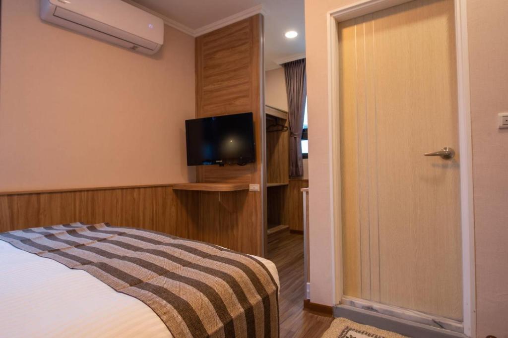 Postel nebo postele na pokoji v ubytování Shan Shui Hostel