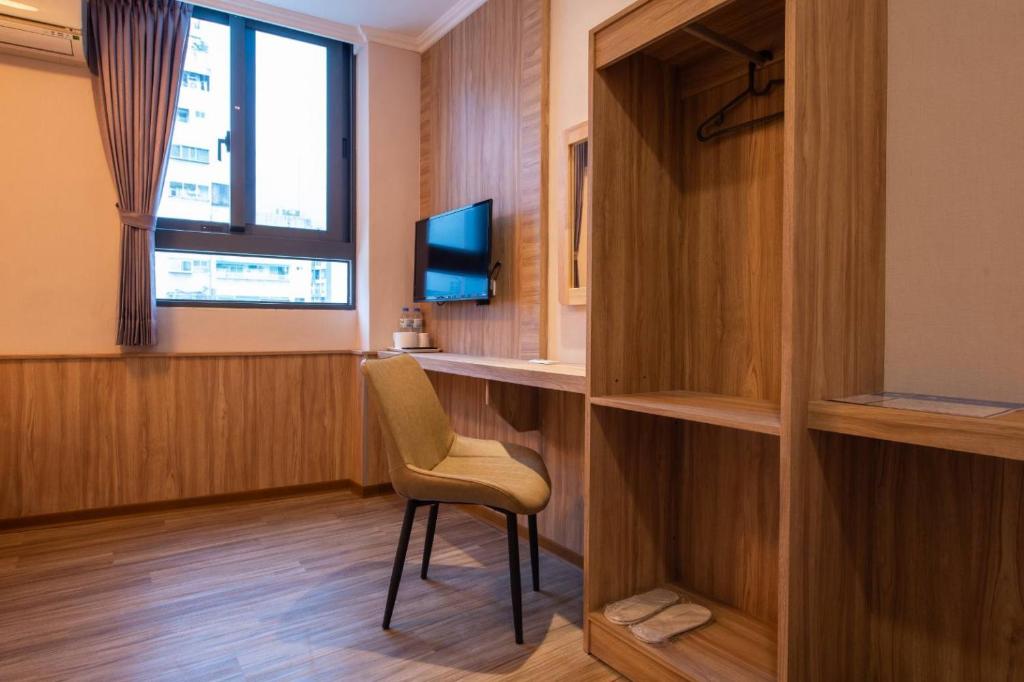 TV a/nebo společenská místnost v ubytování Shan Shui Hostel