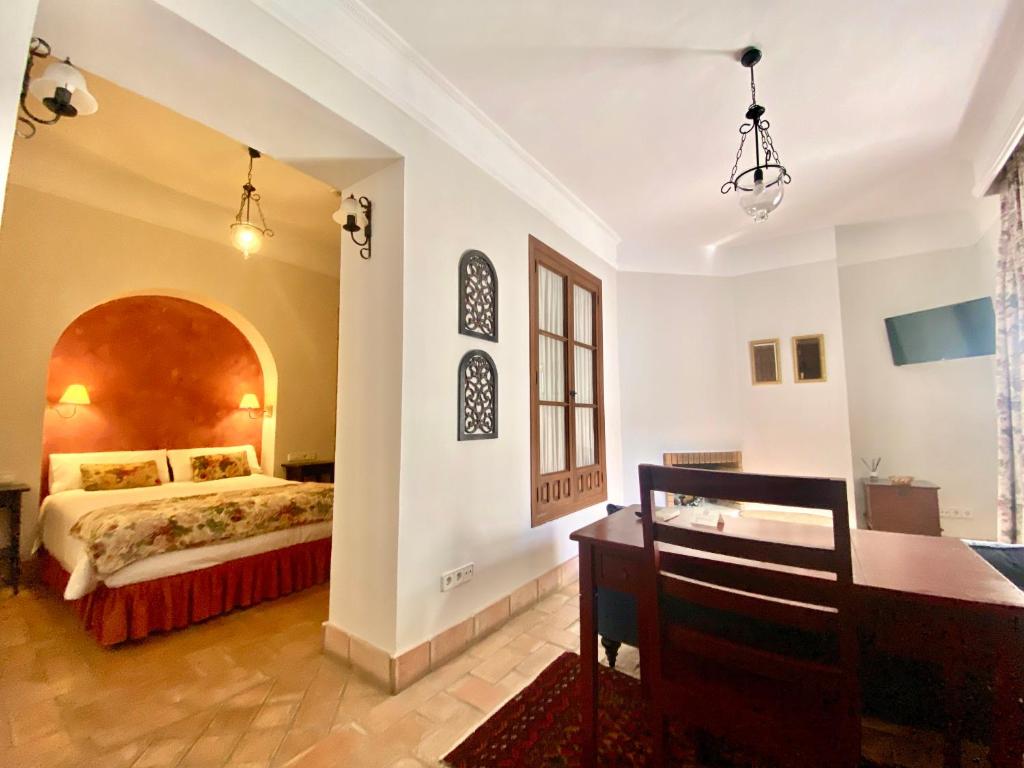 Cama o camas de una habitación en El Rincón de las Descalzas