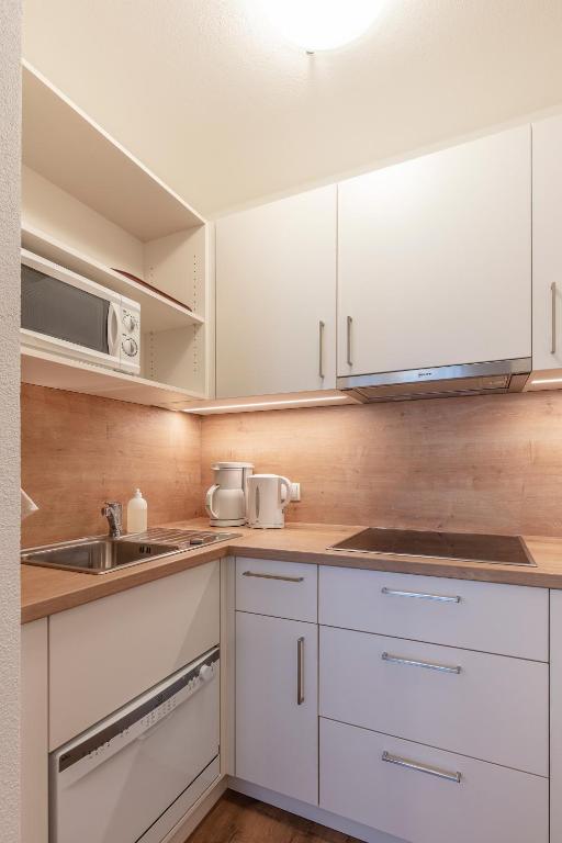 Kuchnia lub aneks kuchenny w obiekcie Appartements Zirmhof