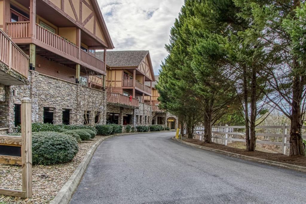 an empty street in front of a building at Owl See You 3205 - Close to Dollywood and Overlooking Gatlinburg Golf Course condo in Pigeon Forge