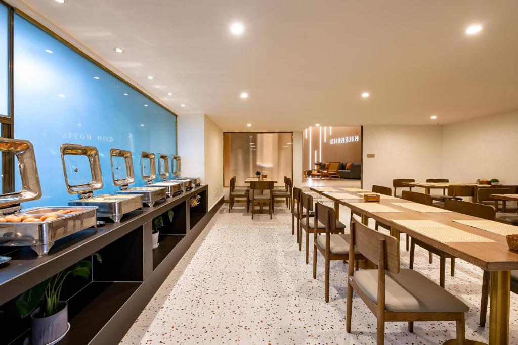 Kuchyň nebo kuchyňský kout v ubytování Cheng Jin Hotel