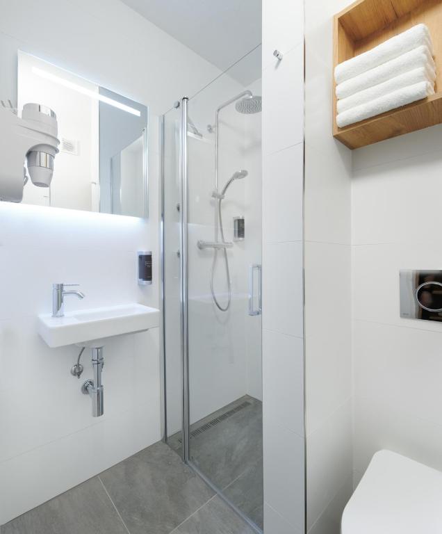 Koupelna v ubytování Wellness Hotel Svornost