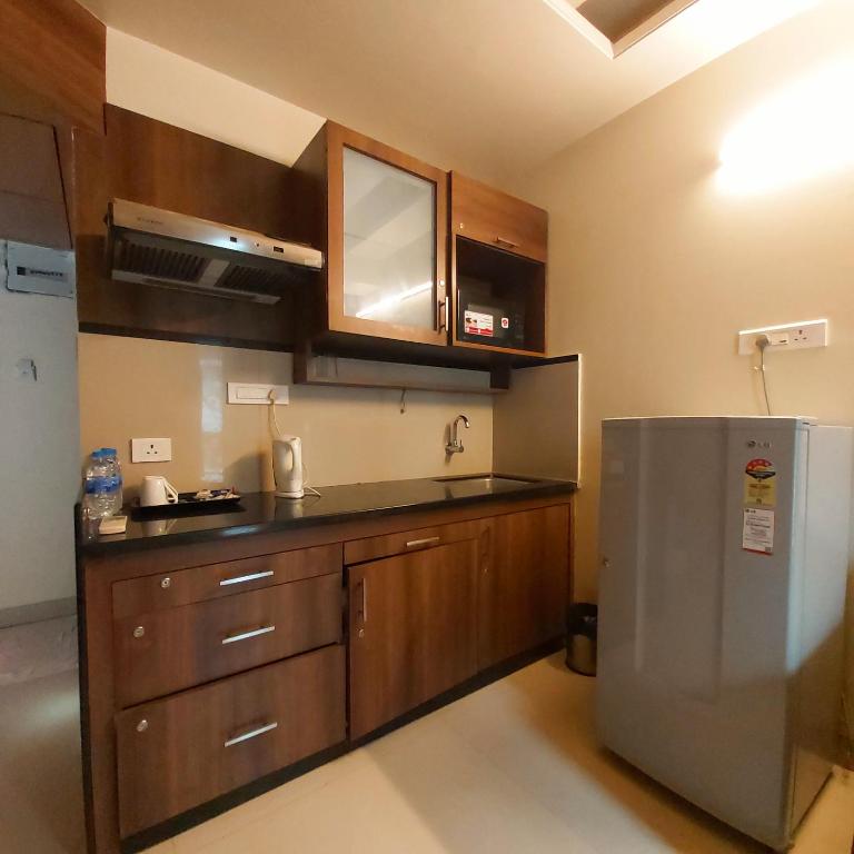 Kuchyň nebo kuchyňský kout v ubytování Quality Inn Mint