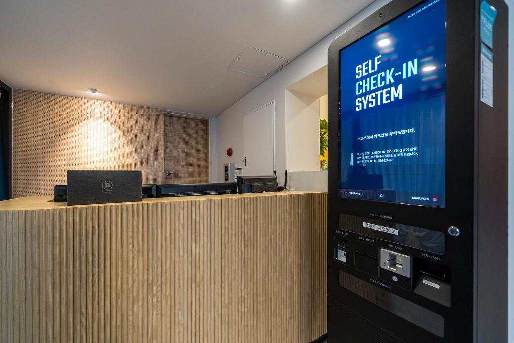 TV a/nebo společenská místnost v ubytování Browndot Hotel Namchuncheon
