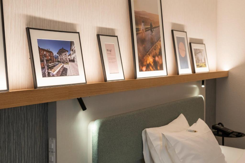Postel nebo postele na pokoji v ubytování Hotel Münchwilen