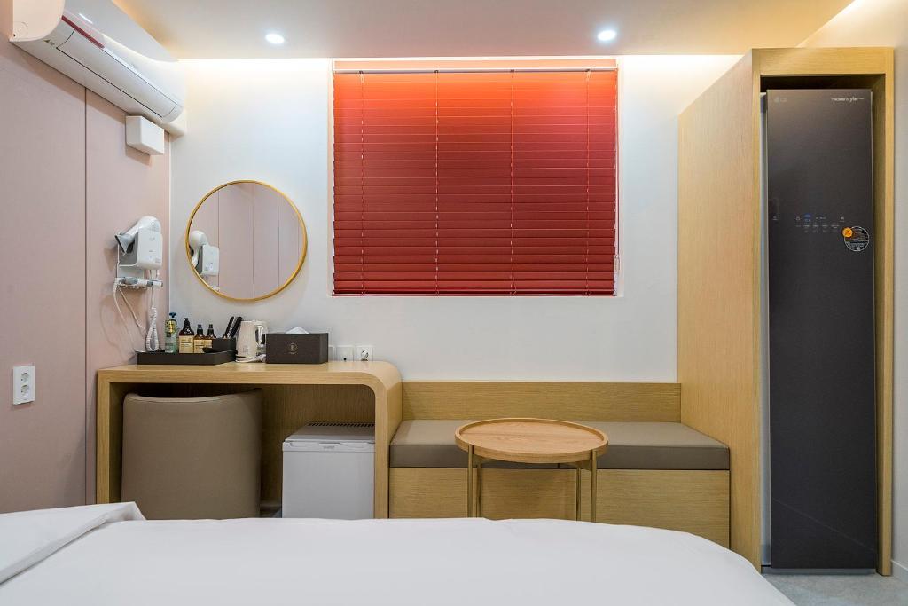 Postel nebo postele na pokoji v ubytování Browndot Hotel Namchuncheon
