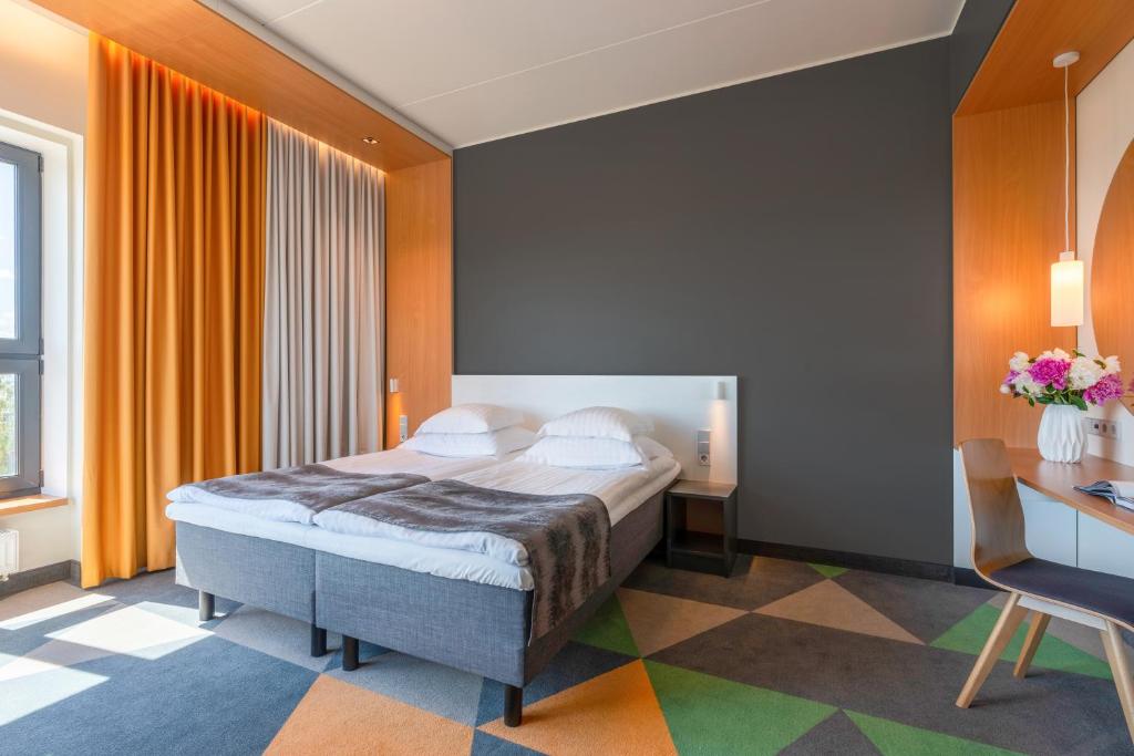 Postel nebo postele na pokoji v ubytování Hotel Sophia by Tartuhotels
