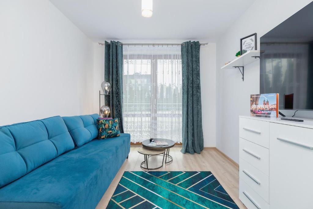 Η κουζίνα ή μικρή κουζίνα στο Bunscha Apartment Dębniki Cracow by Noclegi Renters