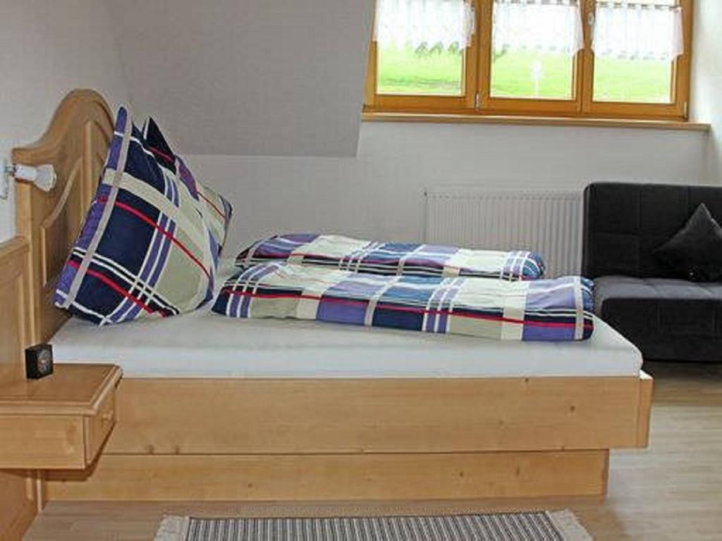 Postel nebo postele na pokoji v ubytování Ferienhof Bitschnau