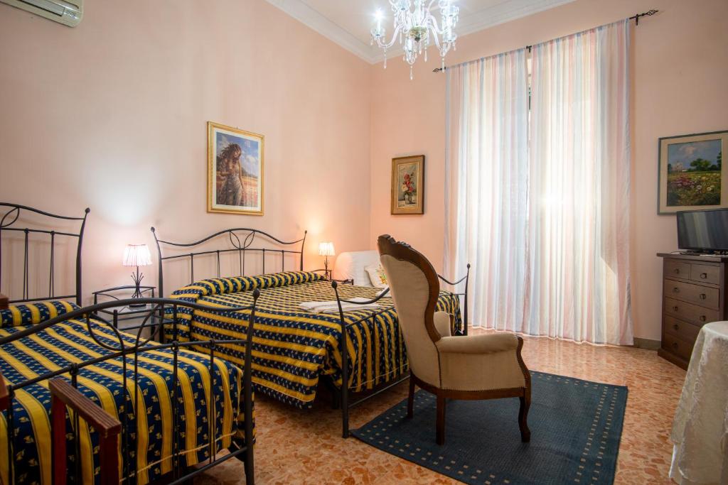 Postel nebo postele na pokoji v ubytování Aci B&B