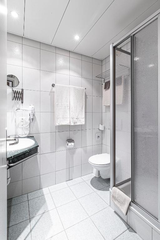 Koupelna v ubytování Hotel Münchwilen