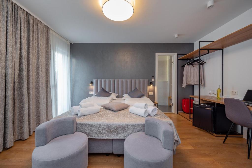Posteľ alebo postele v izbe v ubytovaní Seven Seas Residence