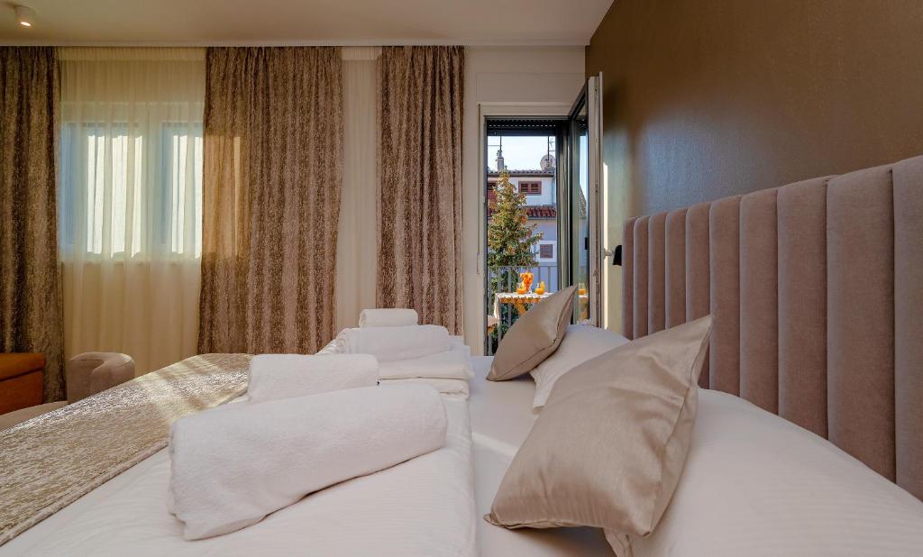 Posteľ alebo postele v izbe v ubytovaní Seven Seas Residence