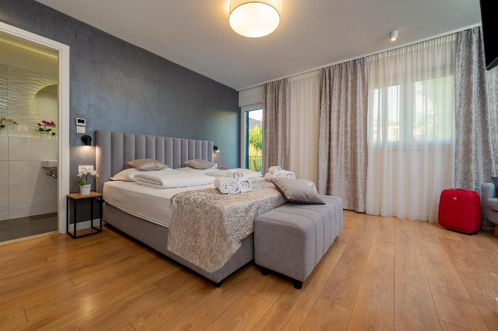 Posteľ alebo postele v izbe v ubytovaní Seven Seas Residence