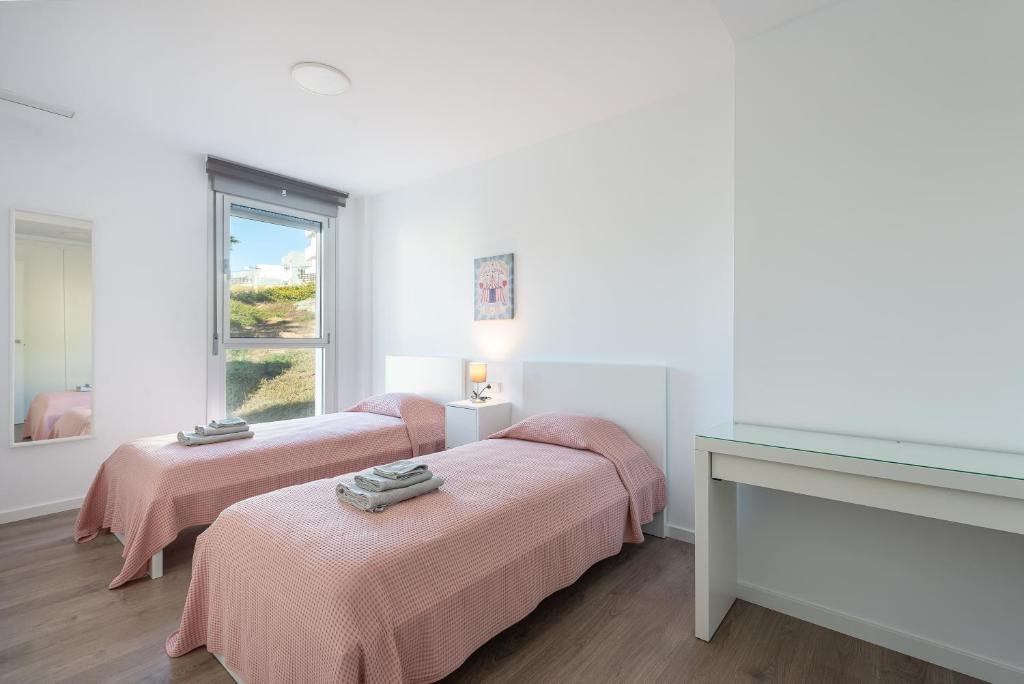 Posteľ alebo postele v izbe v ubytovaní Serenity Collection Appartement 3 chambres Chez Miriam