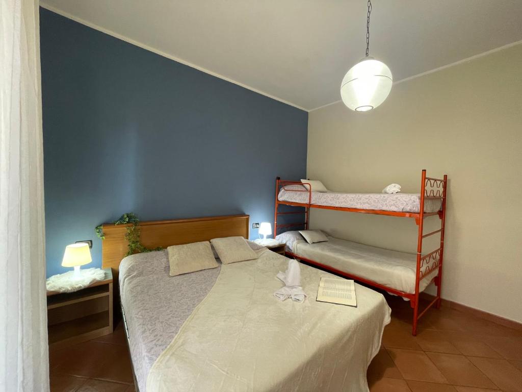 Posteľ alebo postele v izbe v ubytovaní [50 metri dal mare] - Free parking e A/C
