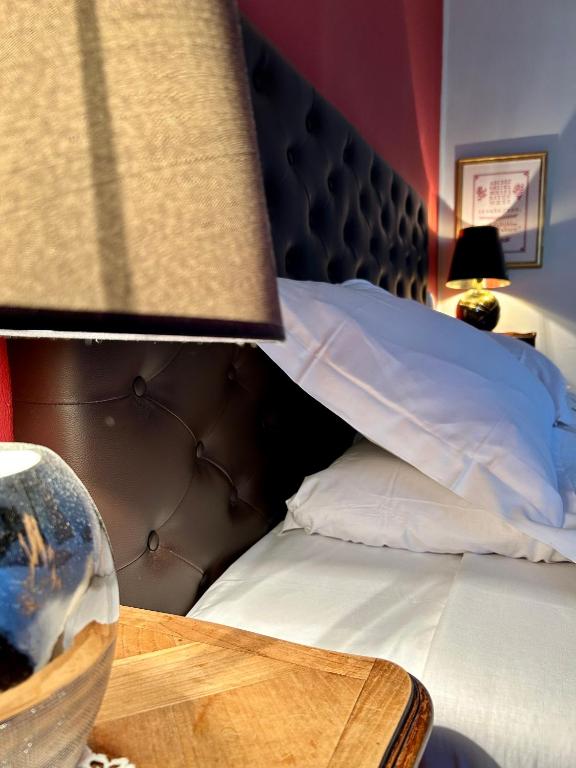 Postel nebo postele na pokoji v ubytování Logis Hôtel Teyssier