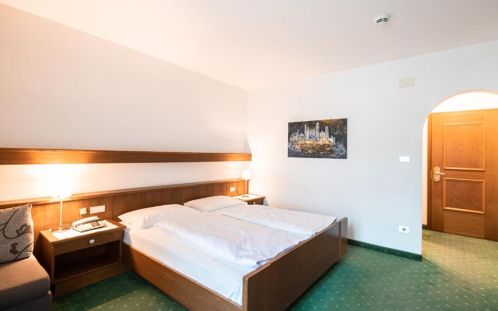 Postel nebo postele na pokoji v ubytování Hotel Reipertingerhof