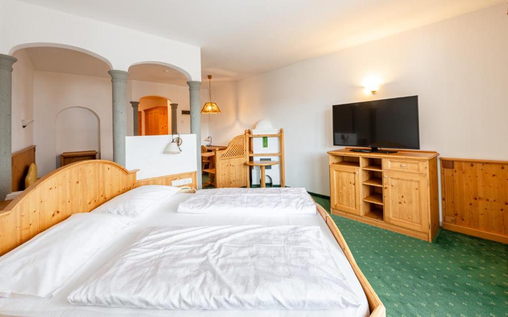 Postel nebo postele na pokoji v ubytování Hotel Reipertingerhof