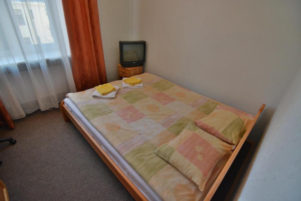 Postel nebo postele na pokoji v ubytování Hotel Multilux with Self Check-in