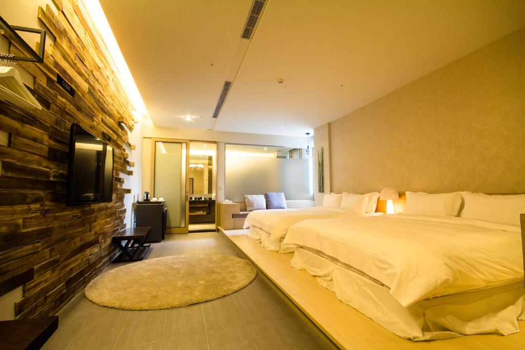 Postel nebo postele na pokoji v ubytování No. 9 Hotel