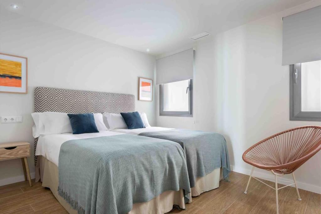 Postel nebo postele na pokoji v ubytování Apartamento LP RENTAL HOME MAGDALENA