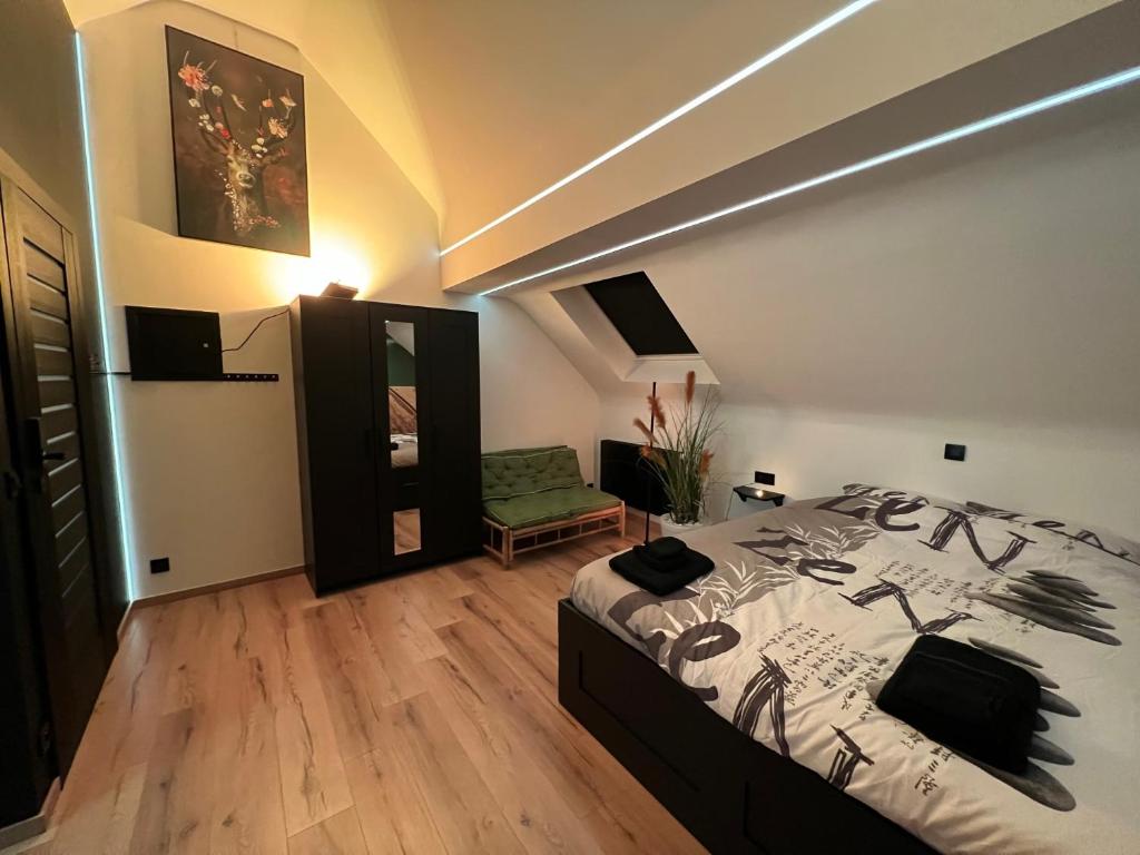 Postel nebo postele na pokoji v ubytování Zen, un studio superlatif