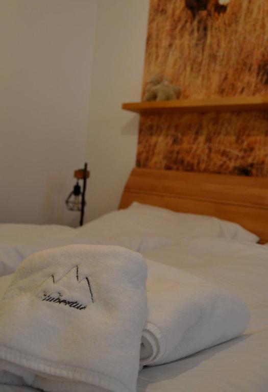 Postel nebo postele na pokoji v ubytování Apartmán Hubertus No 2