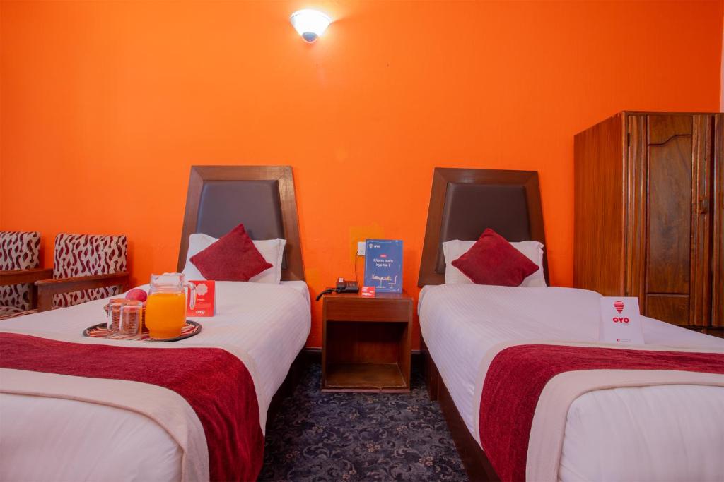 Llit o llits en una habitació de Hotel Snowland