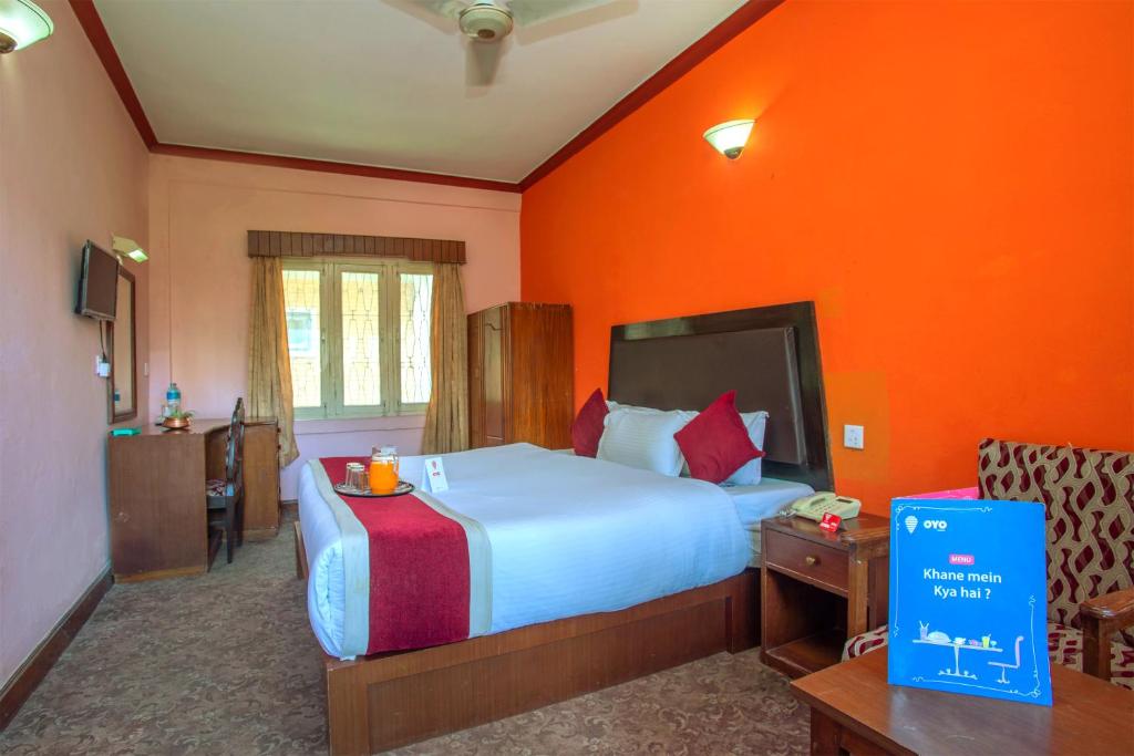 Llit o llits en una habitació de Hotel Snowland