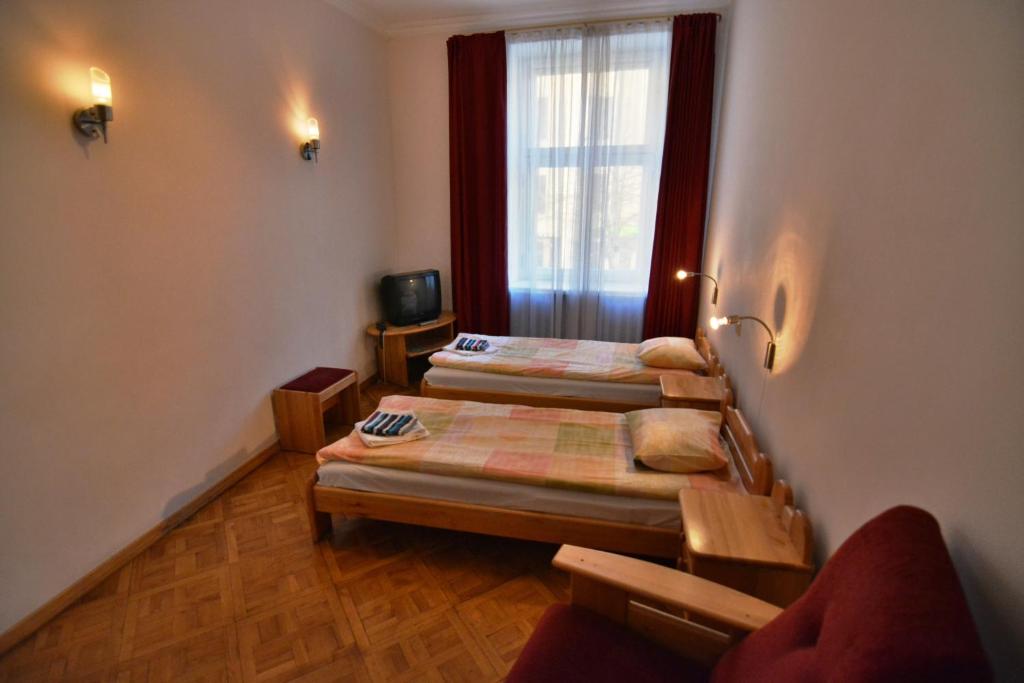 Postel nebo postele na pokoji v ubytování Hotel Multilux with Self Check-in