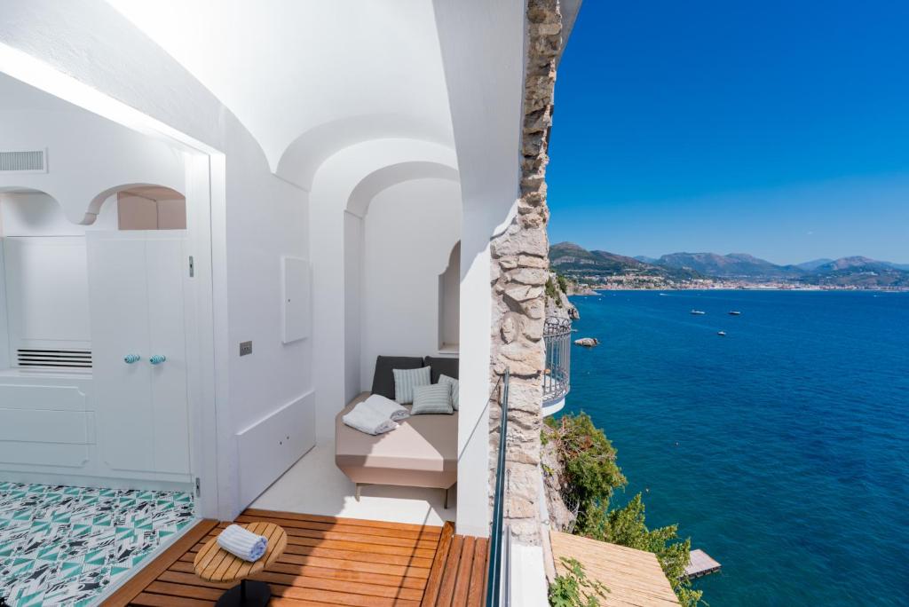 a balcony with a view of the water at Hotel Cetus in Cetara