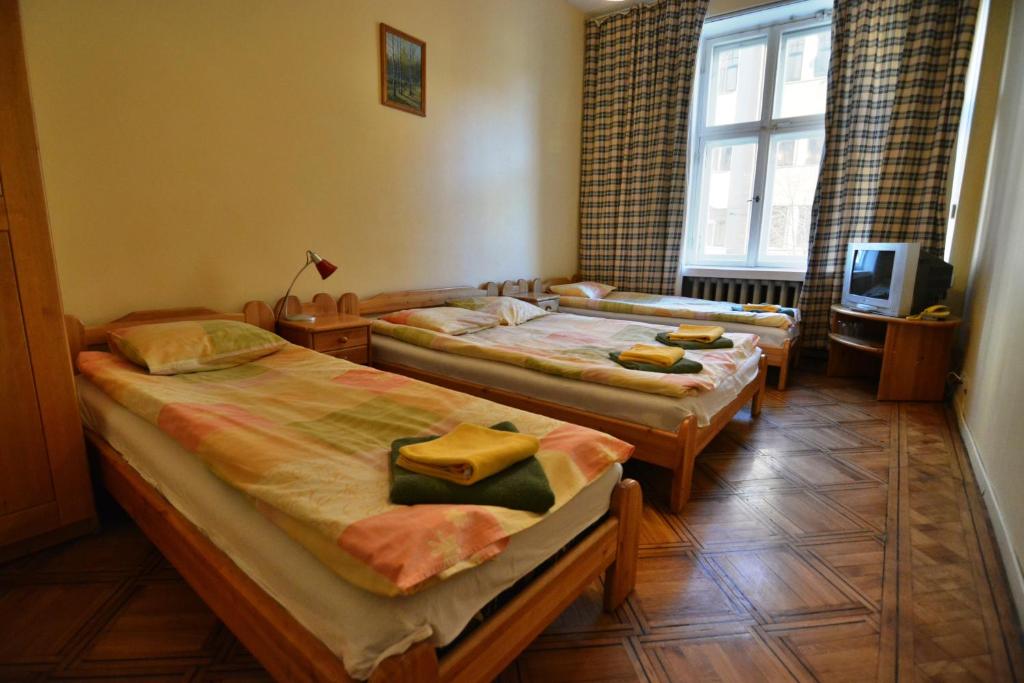 Postel nebo postele na pokoji v ubytování Hotel Multilux with Self Check-in