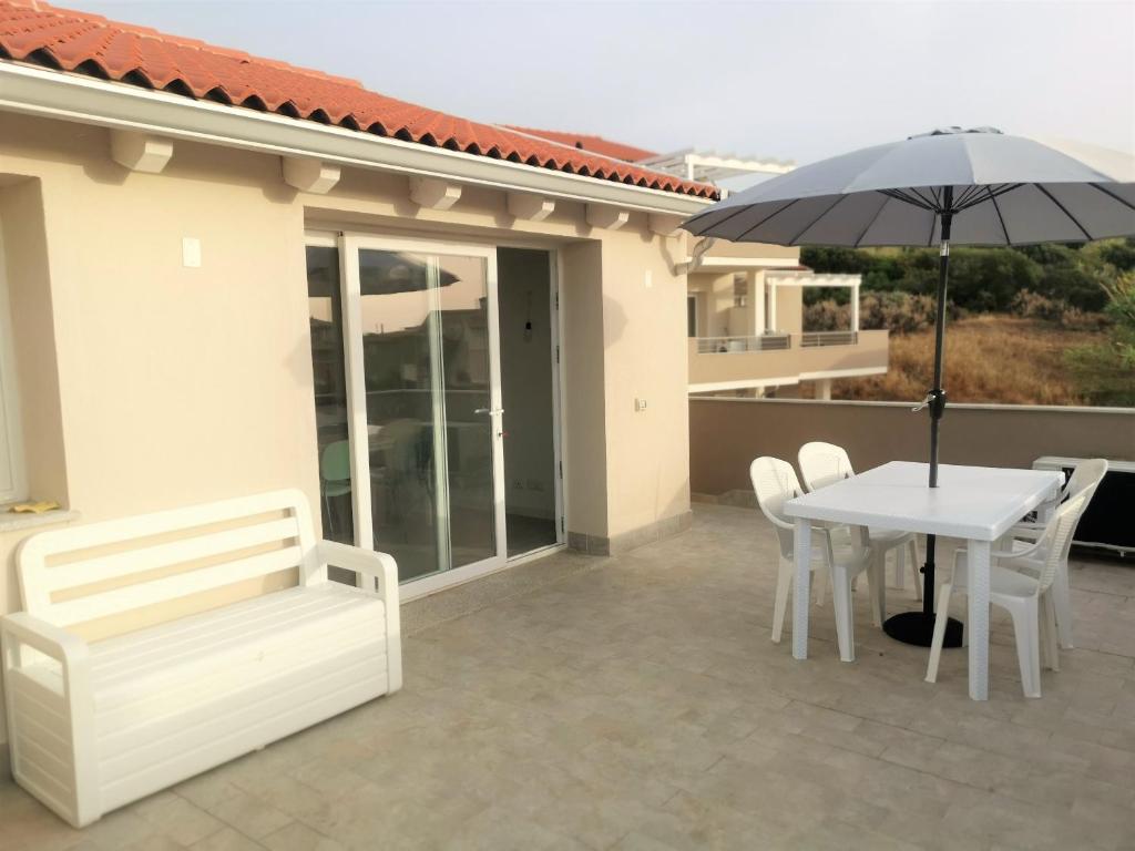 A patio or other outdoor area at Affittimoderni Castelsardo La Gemma