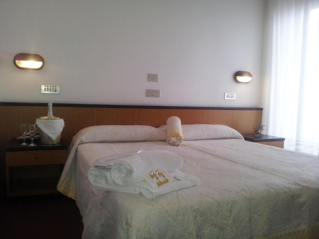 Postel nebo postele na pokoji v ubytování Hotel Montecarlo