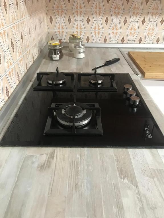 Kuchyň nebo kuchyňský kout v ubytování las camelias