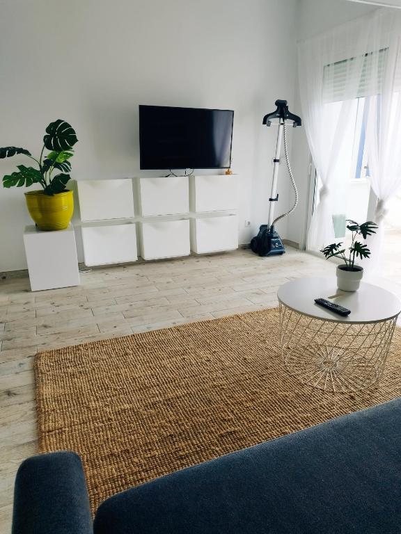 TV a/nebo společenská místnost v ubytování Sunset, Ocean Views 214