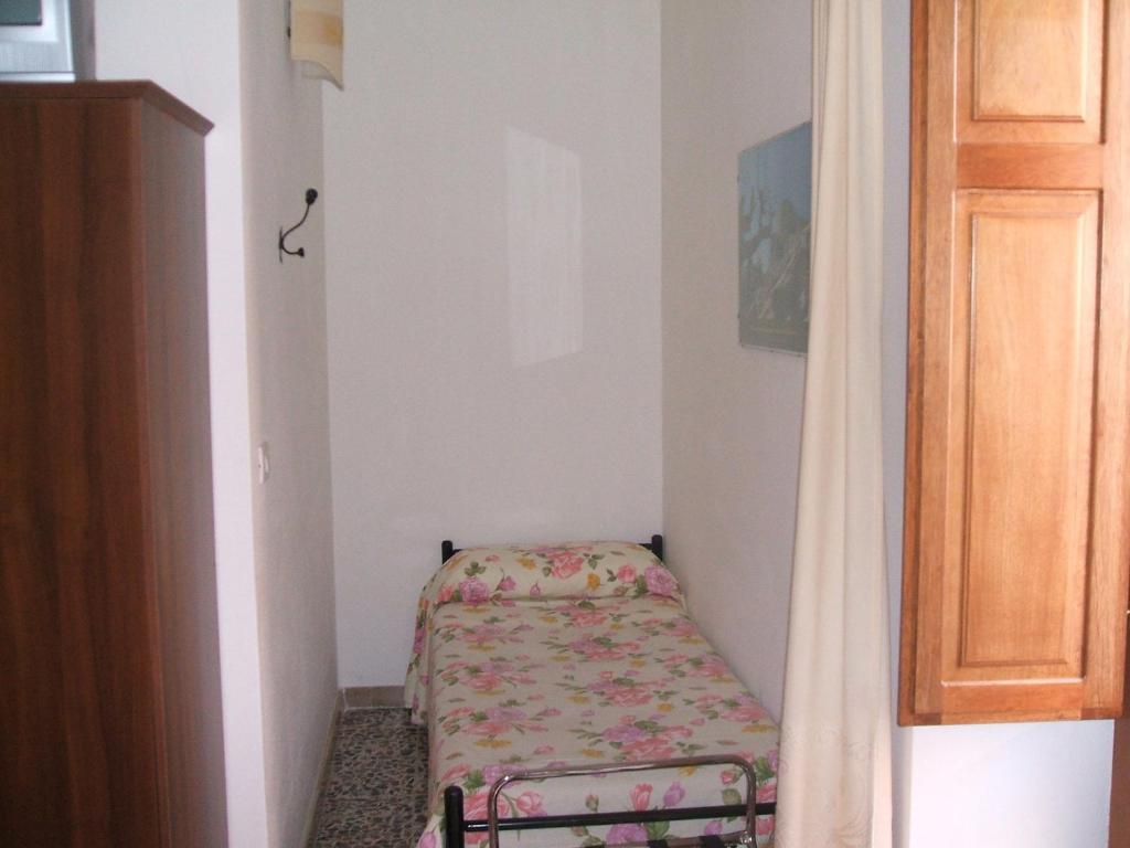 Posteľ alebo postele v izbe v ubytovaní Su Ghindalu Guesthouse