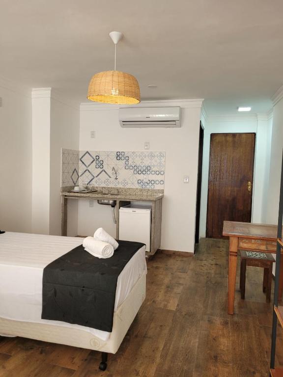 Postel nebo postele na pokoji v ubytování Pelourinho Boutique Hotel - OH HOTÉIS