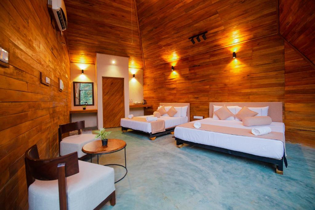 Postel nebo postele na pokoji v ubytování Gabaa Resort & Spa - Habarana
