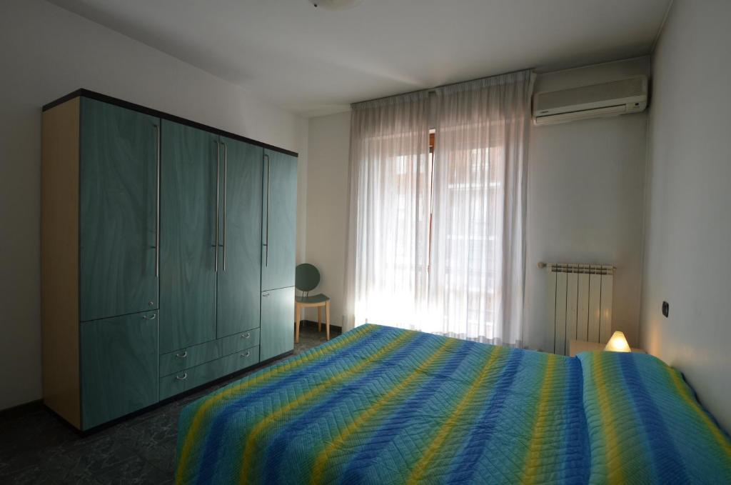 Postel nebo postele na pokoji v ubytování Hotel Residenza Delle Alpi