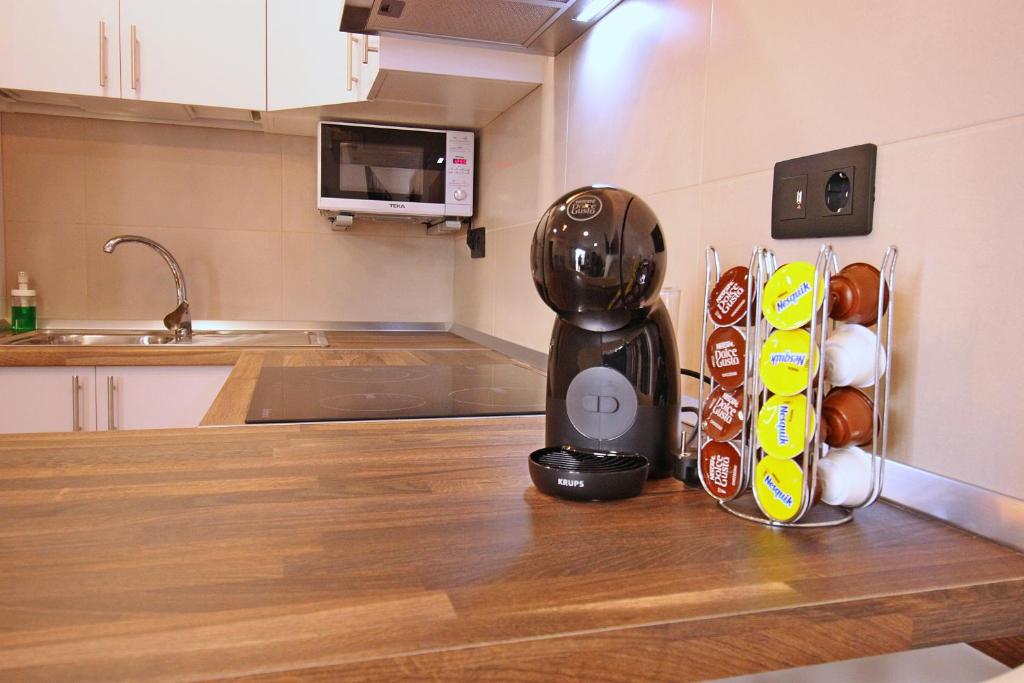 Kuchyň nebo kuchyňský kout v ubytování Apartamento VILLA FLORIDA 116