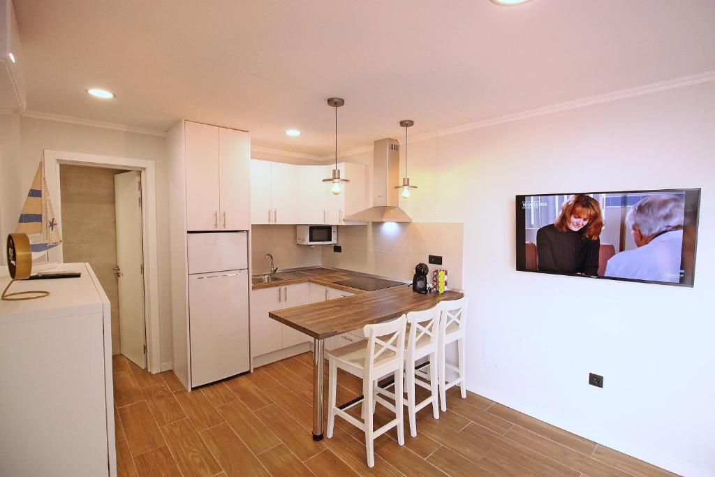 Kuchyň nebo kuchyňský kout v ubytování Apartamento VILLA FLORIDA 116