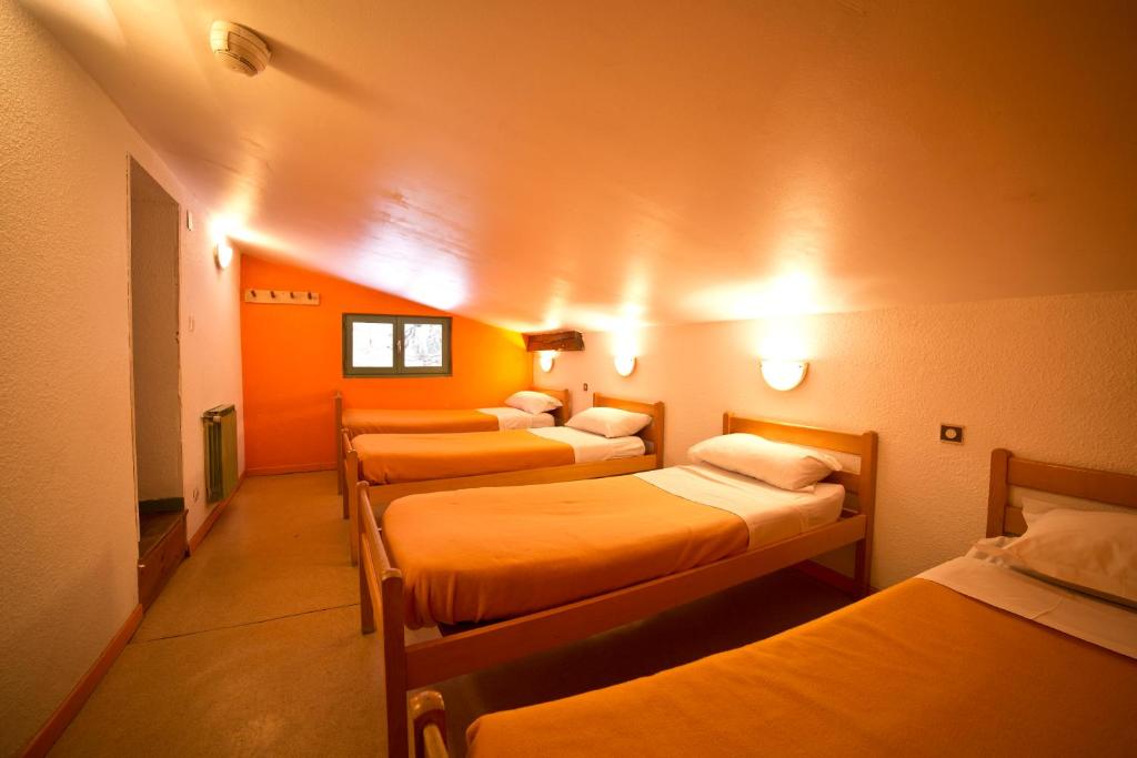 Postelja oz. postelje v sobi nastanitve Centre de Vacances Le Val d'Escreins